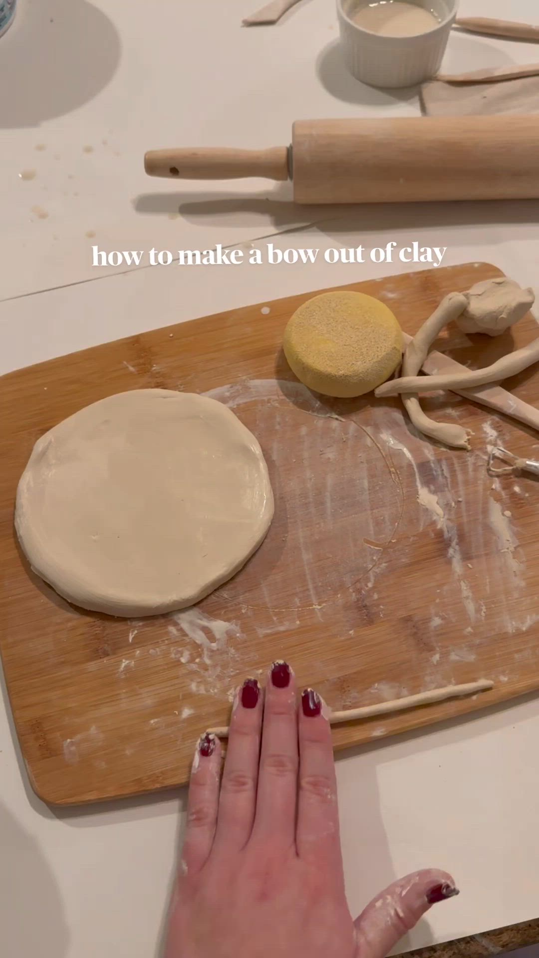 This may contain: a person is making dough on a cutting board