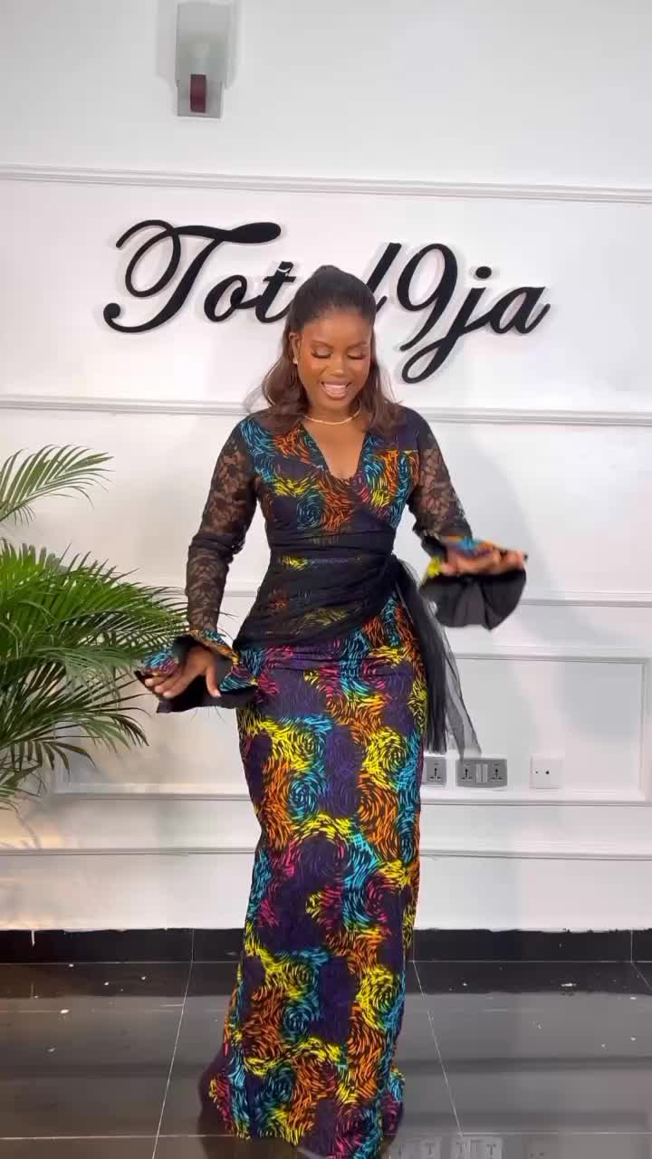 Beautiful Ankara Long Gown with Flare Sleeves Perfect For Your Next Occasion  Credit • Total9ja