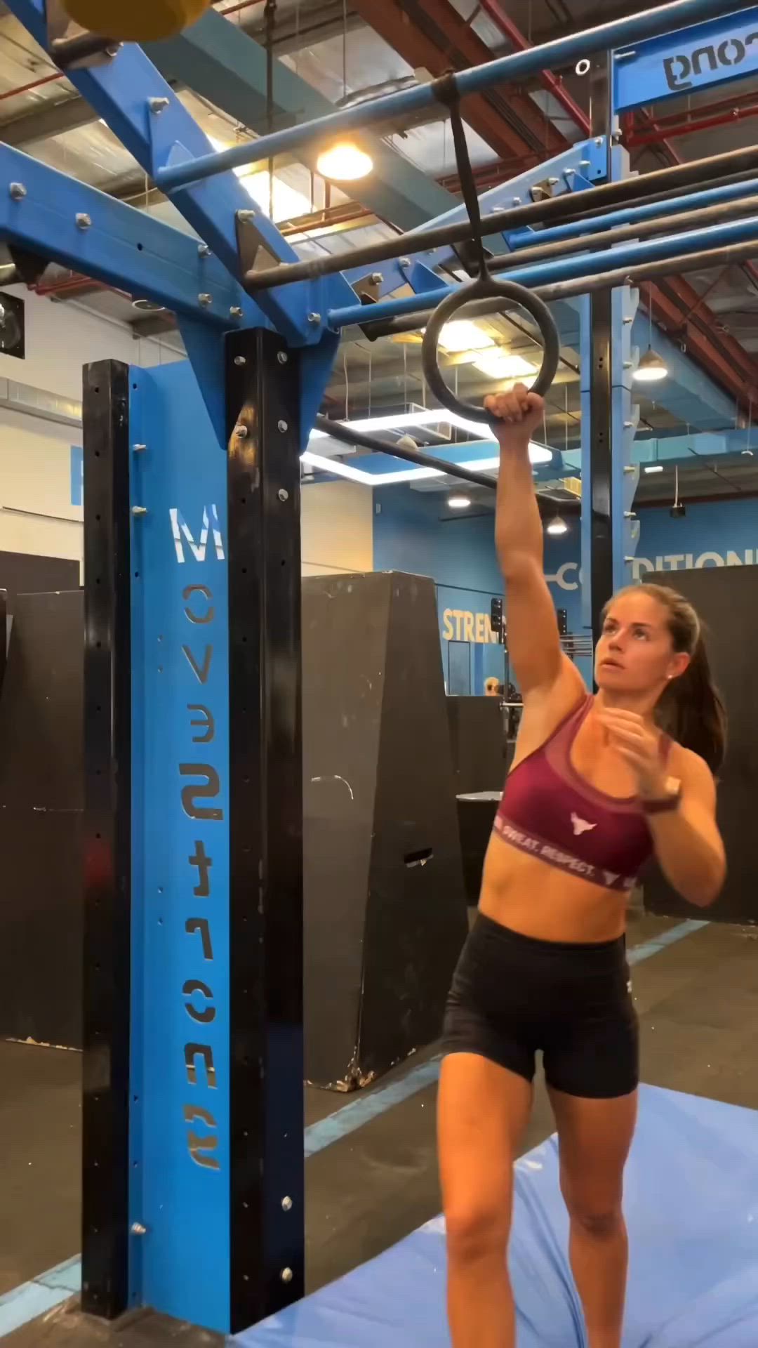 This may contain: a woman is doing exercises in the gym