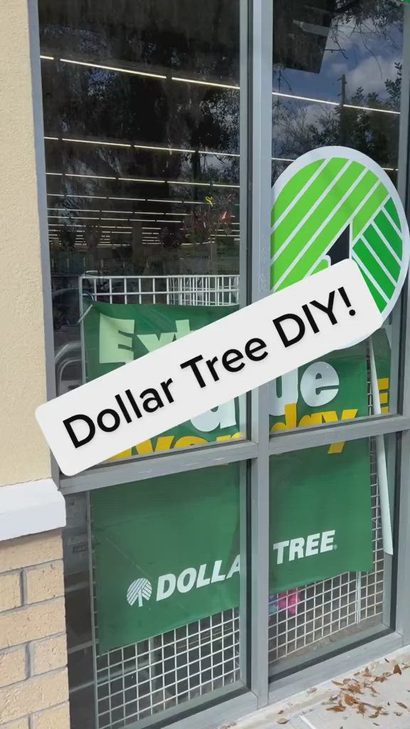 This may contain: there is a dollar tree sign in the window