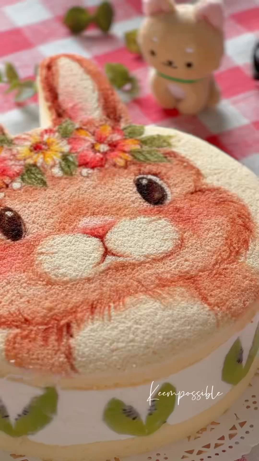 This may contain: a cake decorated with an image of a rabbit