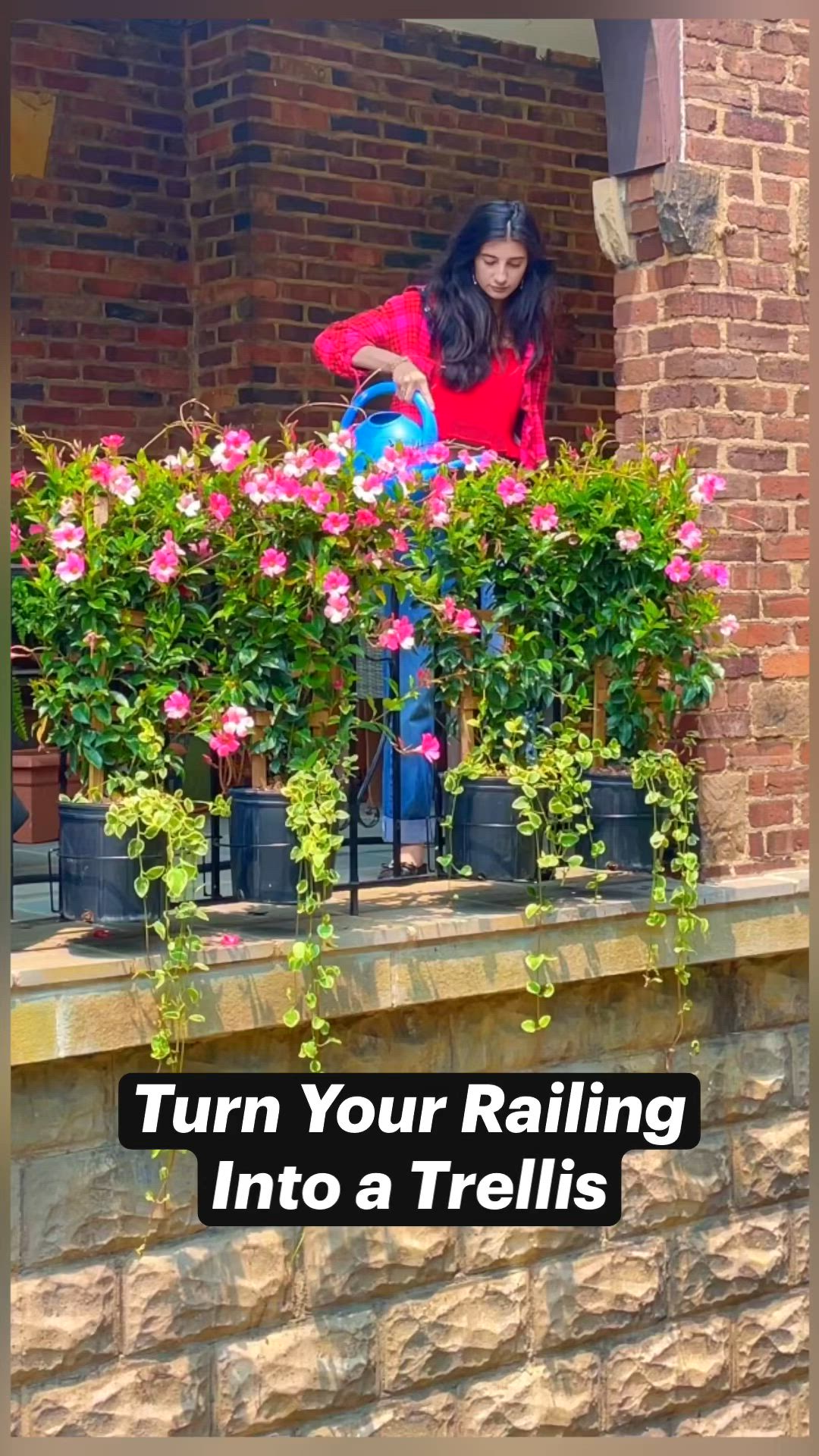 This may contain: a woman sitting on a balcony with flowers in the windowsill and text that reads, turn your railing into a trellis