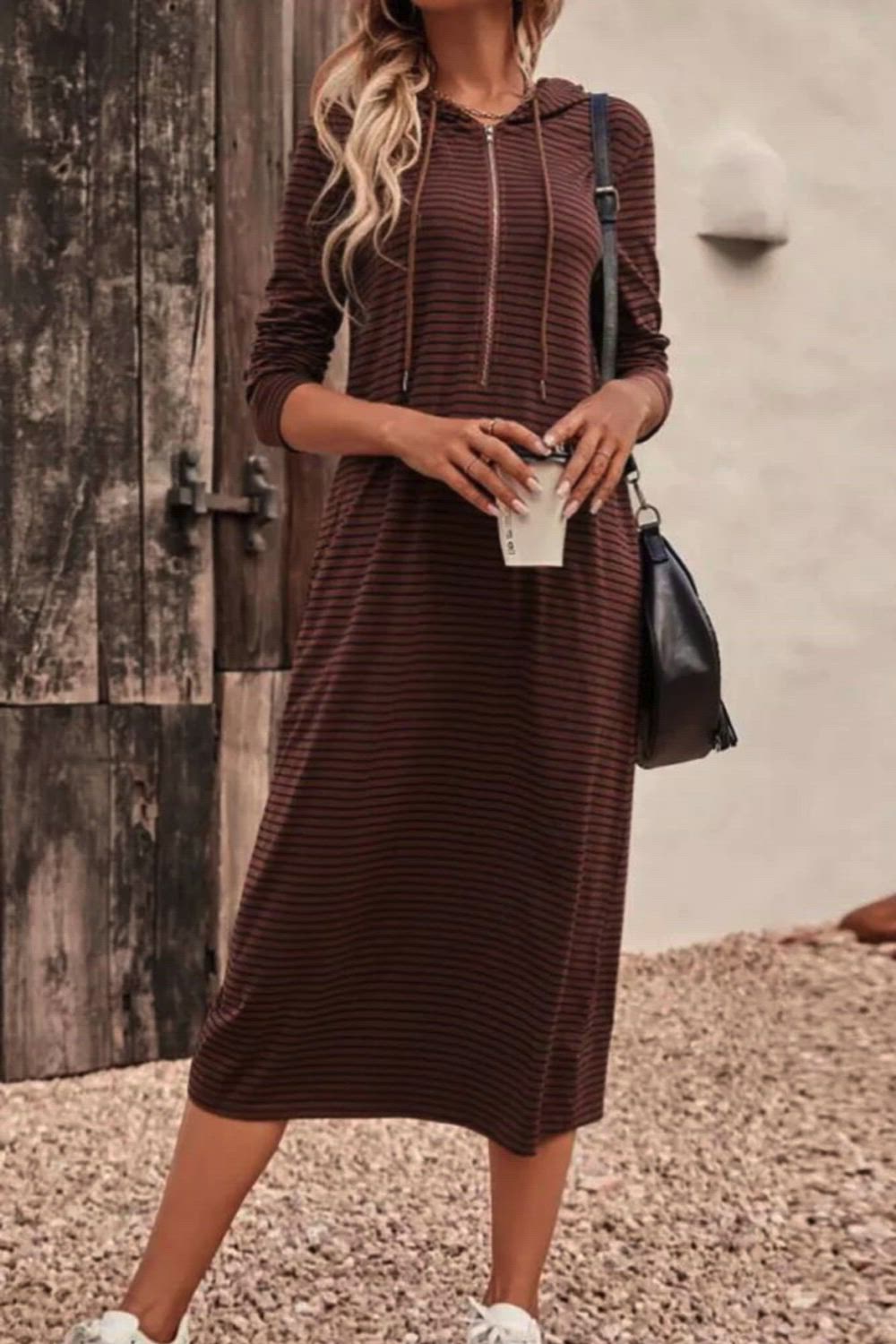 Elevate your casual style with our Striped Hooded Slim Long Sleeve Dress. This dress combines comfort and fashion, featuring a sleek, slim fit and chic striped pattern. The long sleeves provide warmth, making it a versatile piece for various occasions. The added hood adds a trendy, laid-back touch to the overall design.