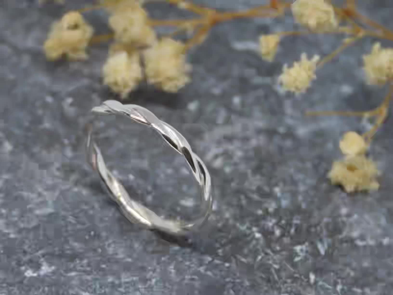 This flattened twist ring would make an elegant wedding ring or stacking ring.