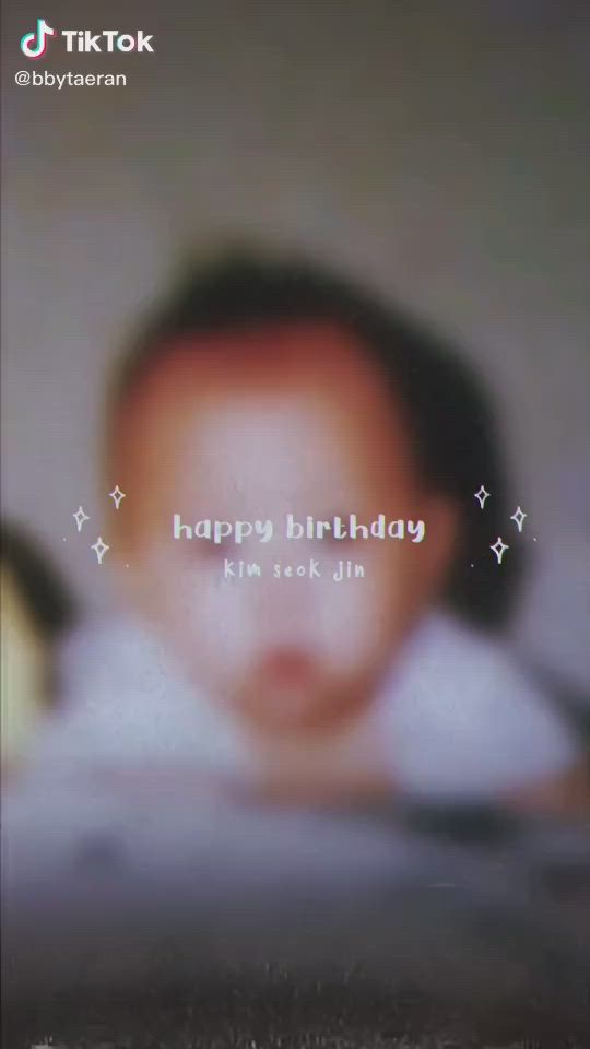 This may contain: a blurry photo of a baby's face with the words happy birthday kim soo jin