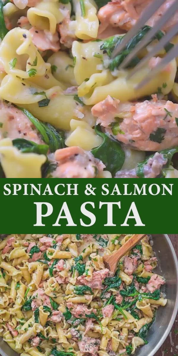 This may contain: spinach and salmon pasta in a pan with a wooden spoon