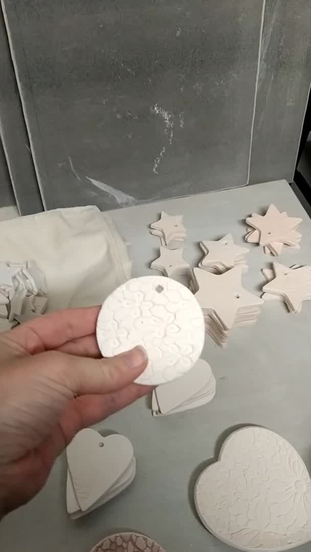 This contains an image of: Pressed lace Christmas decorations