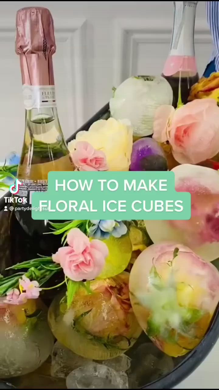 This may contain: flowers and ice cubes in a bowl with the words how to make floral ice cubes