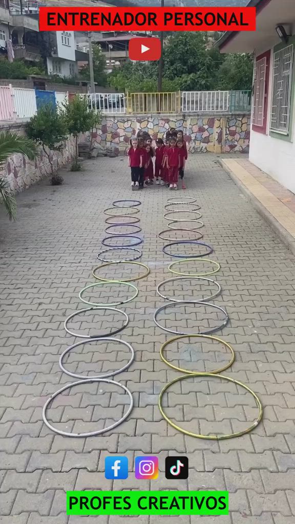 This may contain: a group of people walking down a brick road