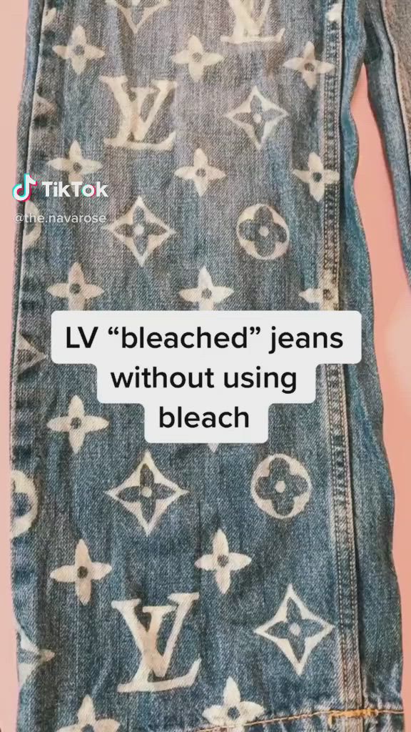 This may contain: an old jean jacket with the words lv bleached jeans without using bleach