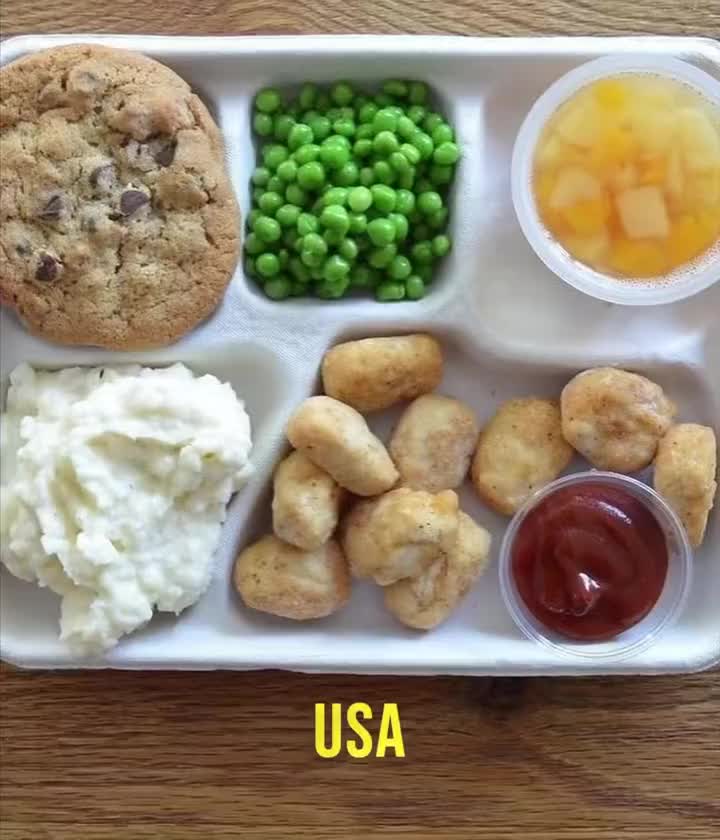 This may contain: a plastic tray filled with different types of food