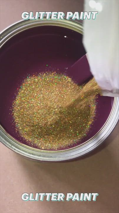 This may contain: a person is pouring glitter into a purple bowl with the words glitter paint on it