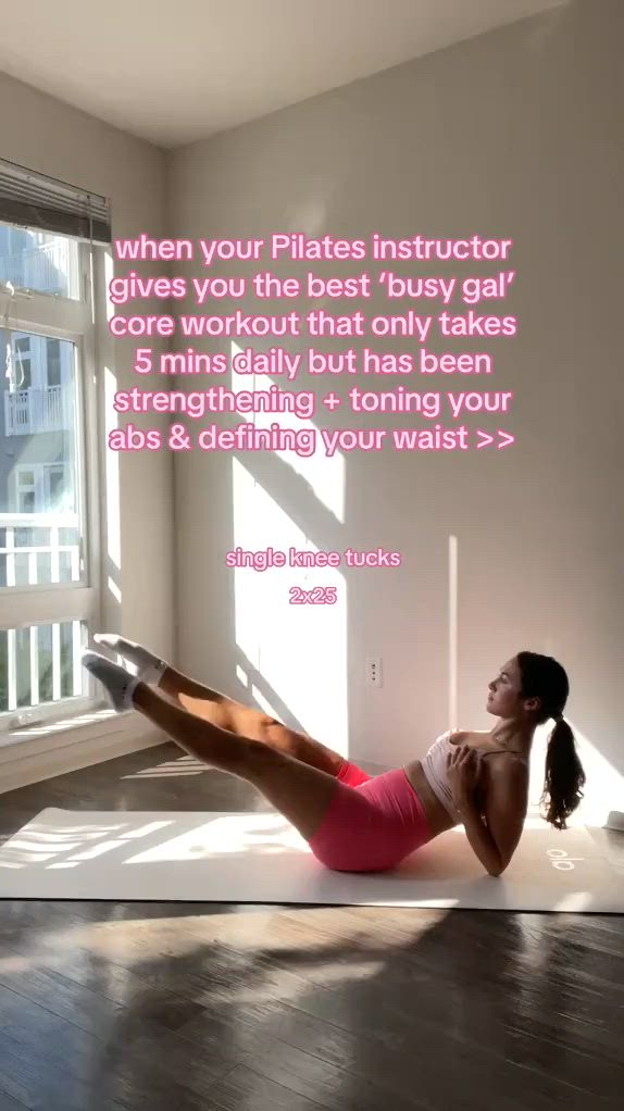 This may contain: a woman is doing exercises on the floor in front of a window with an inspirational quote