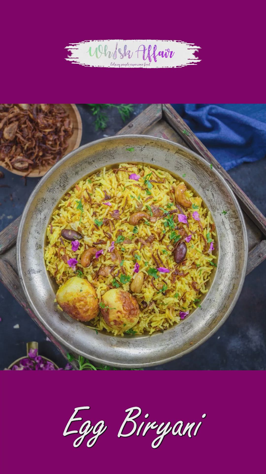 This may contain: an egg biriyani is served in a bowl with rice and other foods