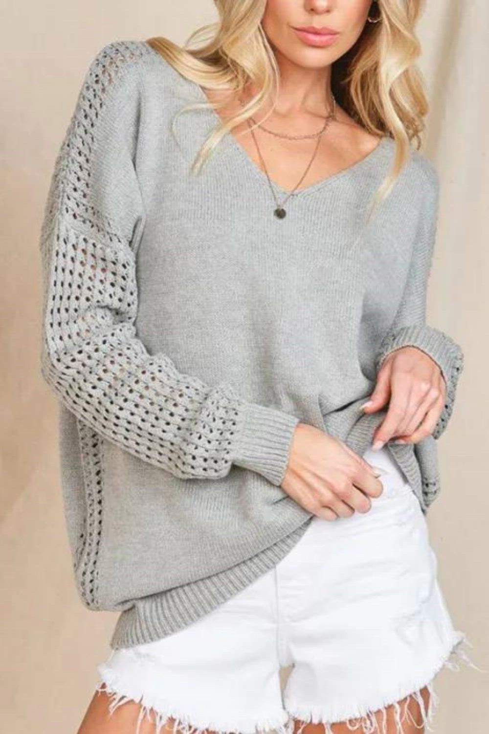 Elevate your style with our Women's New V-Neck Solid Color Knitted Hollow Sweater. This versatile sweater showcases classic design with a flattering V-neck and intricate hollow details, creating a chic and sophisticated look. Perfect for various occasions, it's the ideal addition to your wardrobe for a fashionable and polished appearance.