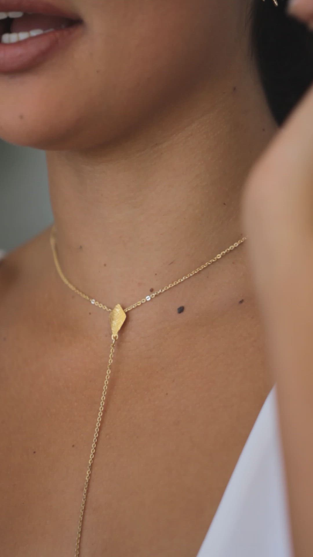 Gold filled Y necklace, minimalist yet striking, with a leaf pendant