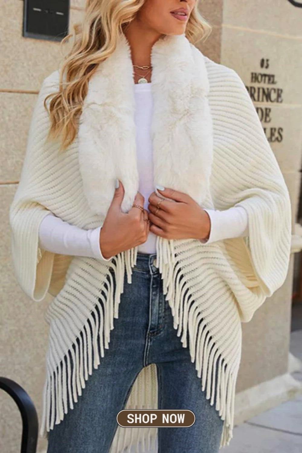 This Fur Collar Fringed Knit Shawl Sweater combines warmth and style effortlessly. The luxurious fur collar adds a touch of elegance, while the fringed knit shawl brings a trendy, bohemian flair. Embrace comfort and fashion in this cozy, chic sweater, perfect for the colder seasons.