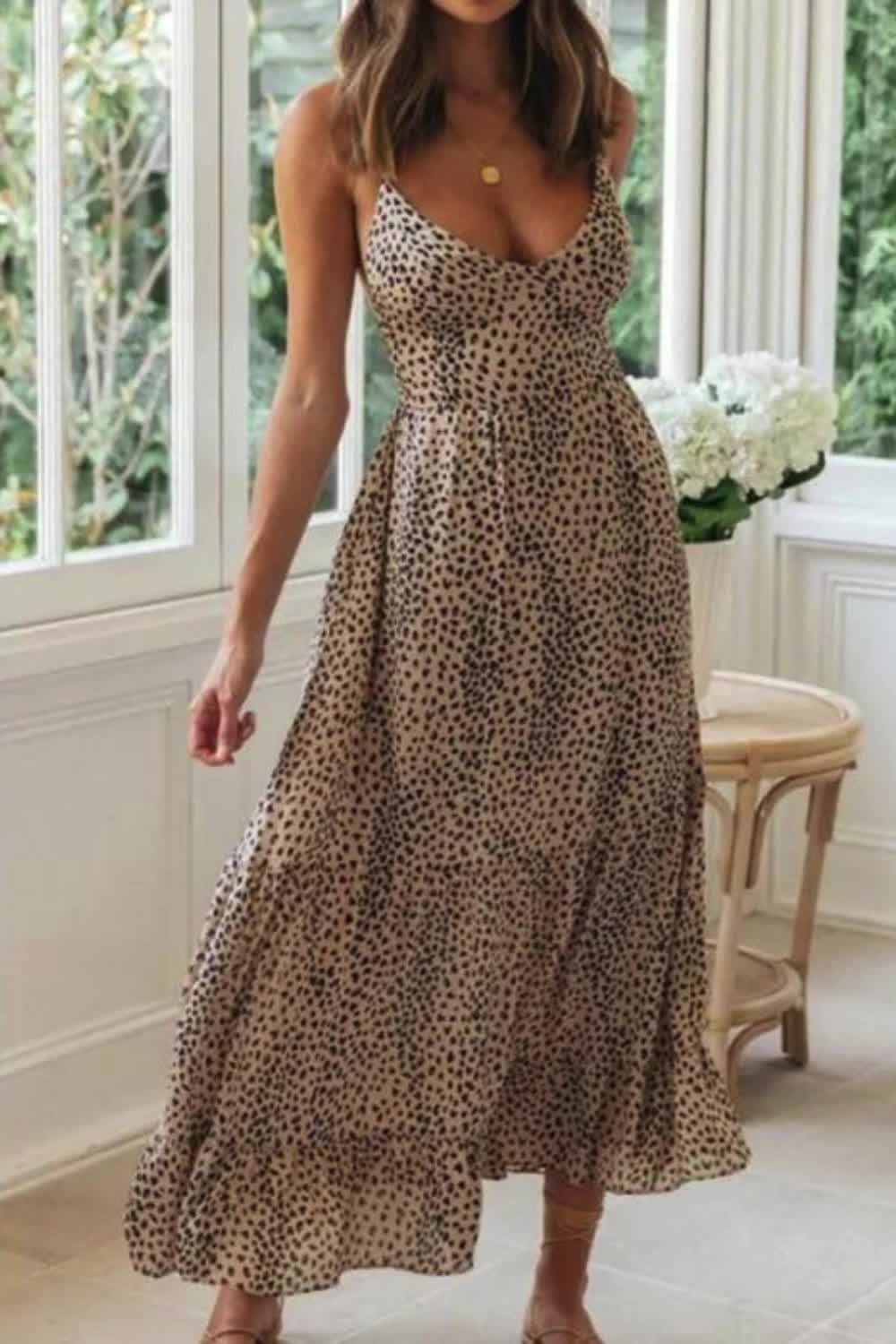 "Unleash your wild side with our Women's Sexy Leopard Print Sleeveless Backless Deep V Neck Dress. This bold dress features a daring deep V neck and a captivating backless design, perfect for making a statement."