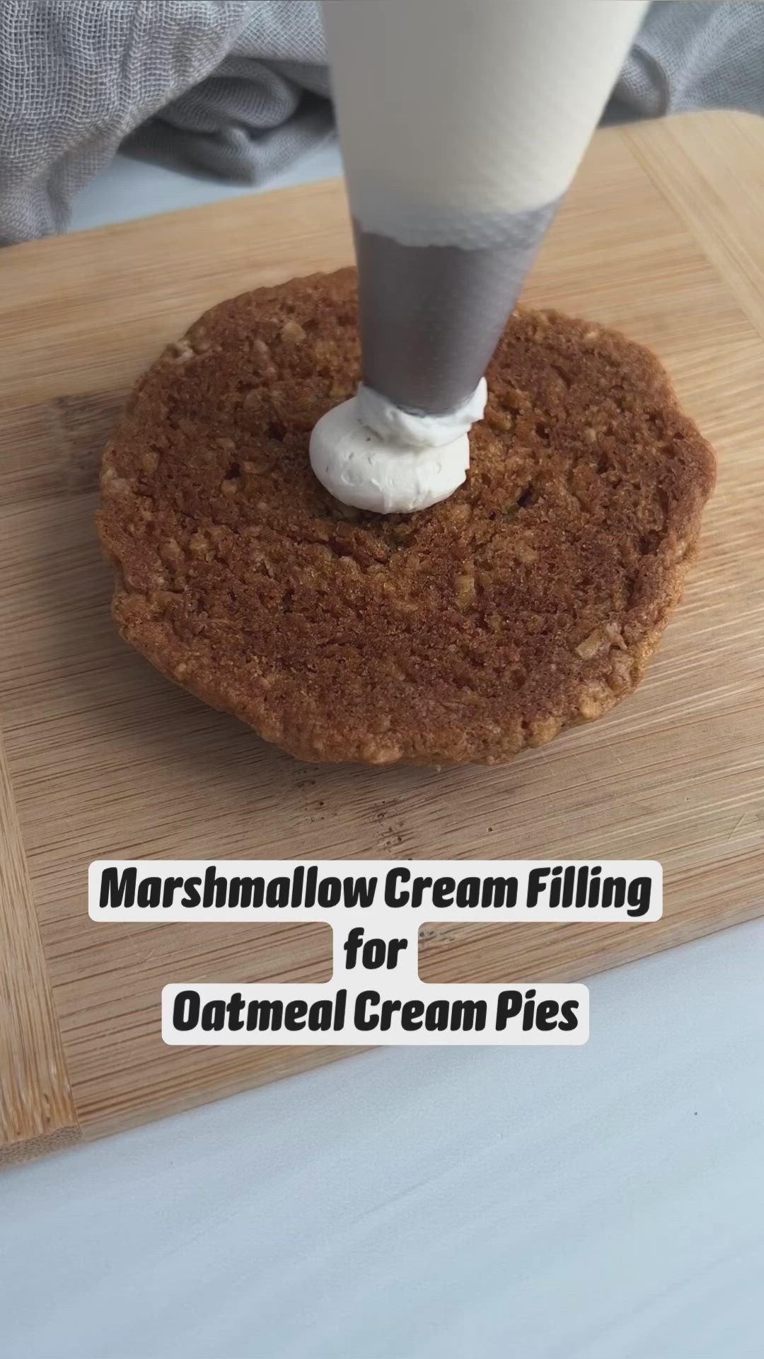 This may contain: marshmallow cream filling for oatmeal cream pies