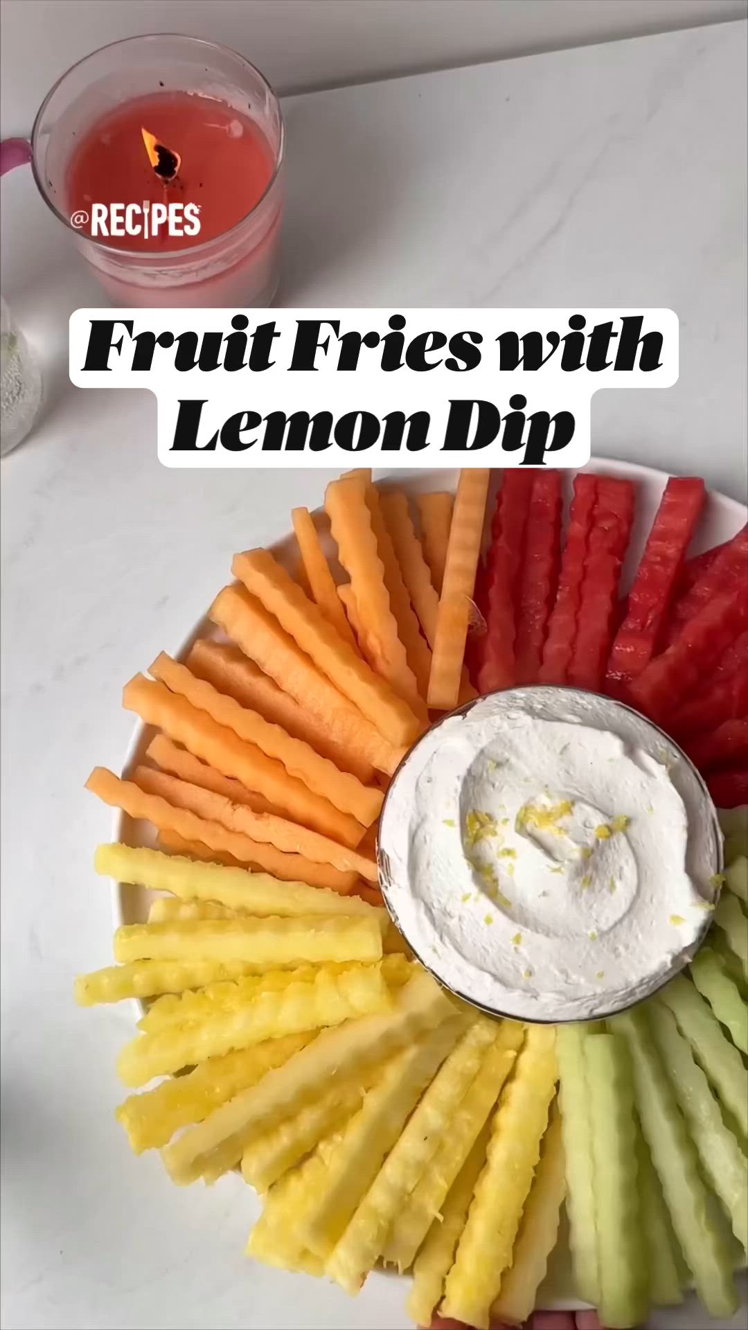 This may contain: fruit fries with lemon dip on a plate