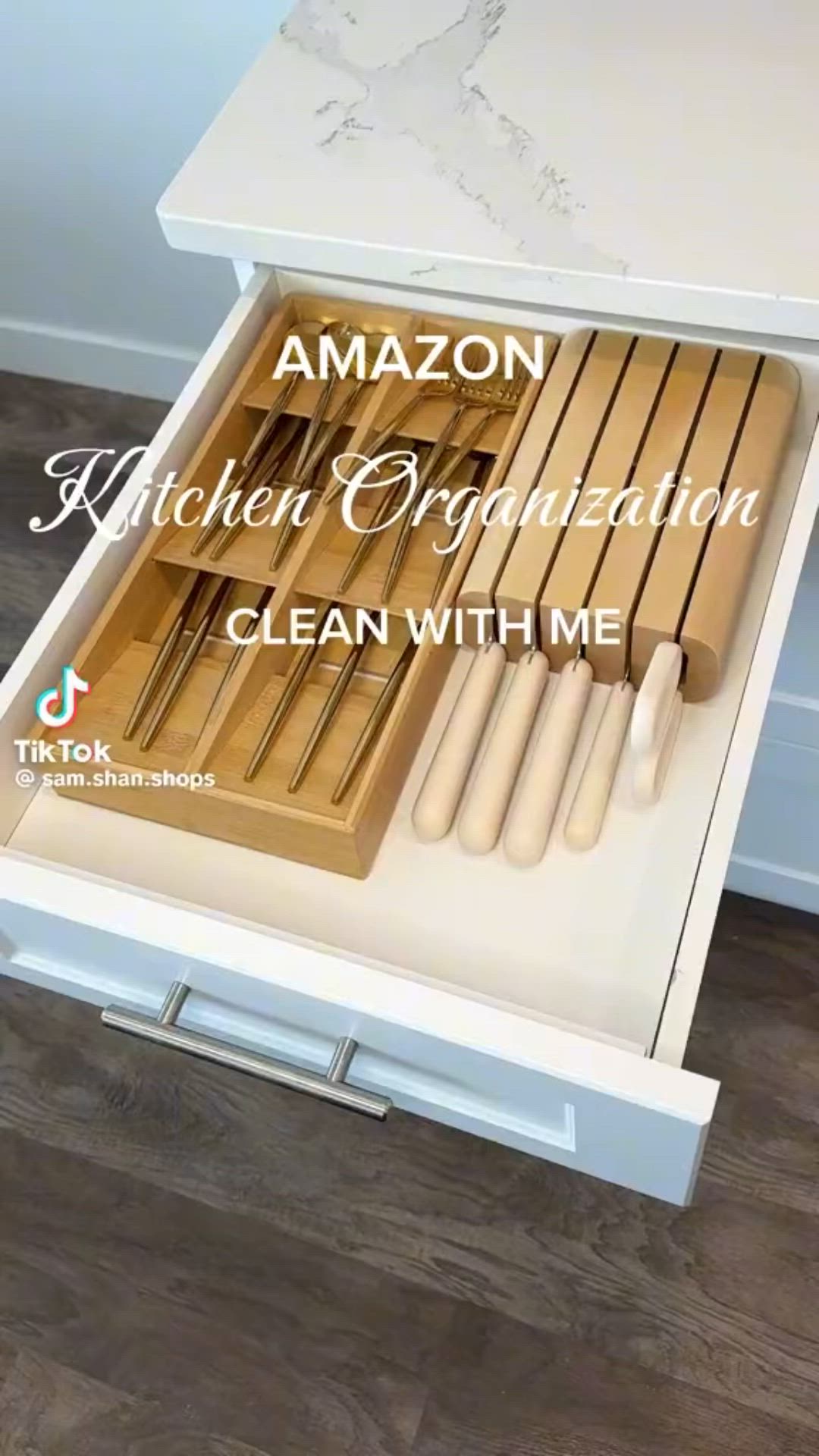 This may contain: an open drawer with wooden utensils in it and the words amazon kitchen organization clean with me