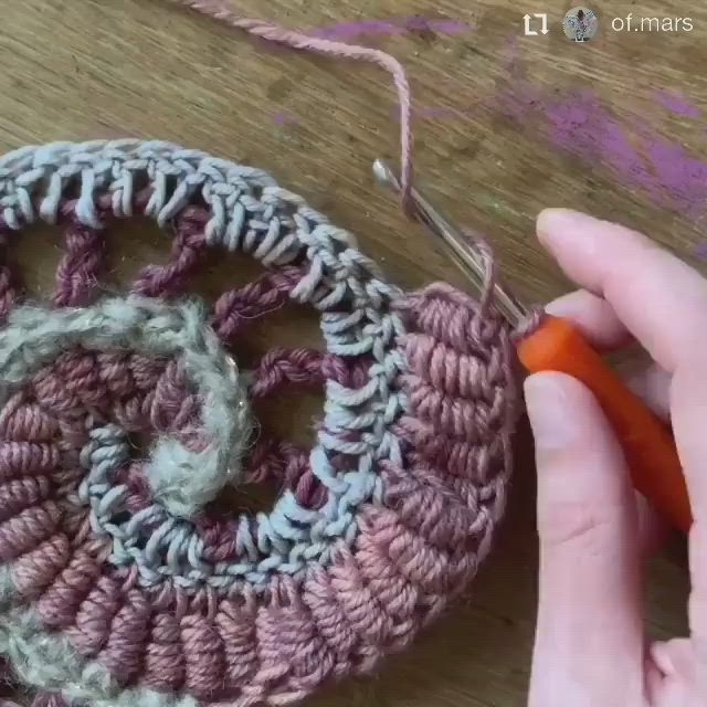 This may contain: someone is crocheting an ornament with yarn