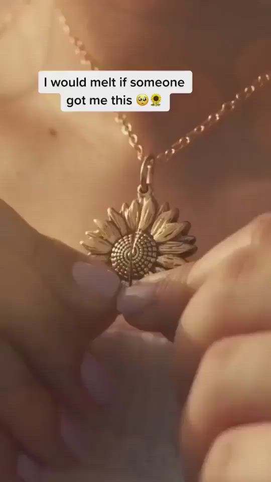 This contains: "You Are My Sunshine" Sunflower Necklace