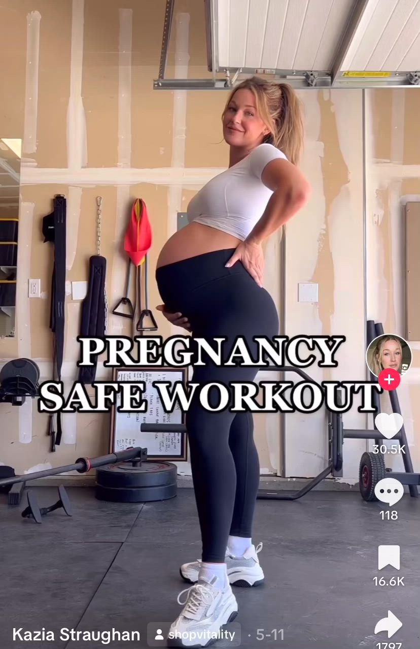 This may contain: the pregnant woman is doing exercises for her baby bump in this video, she's smiling at the camera