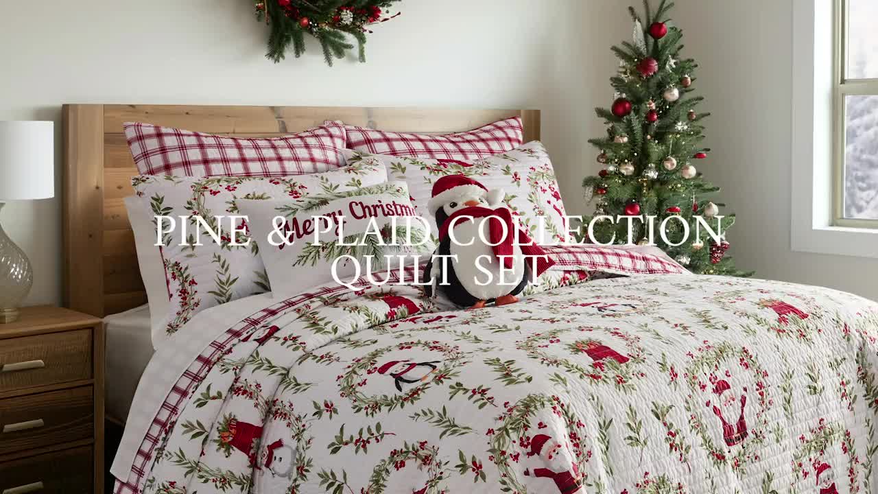 This may contain: a bed room with a neatly made bed and christmas decorations