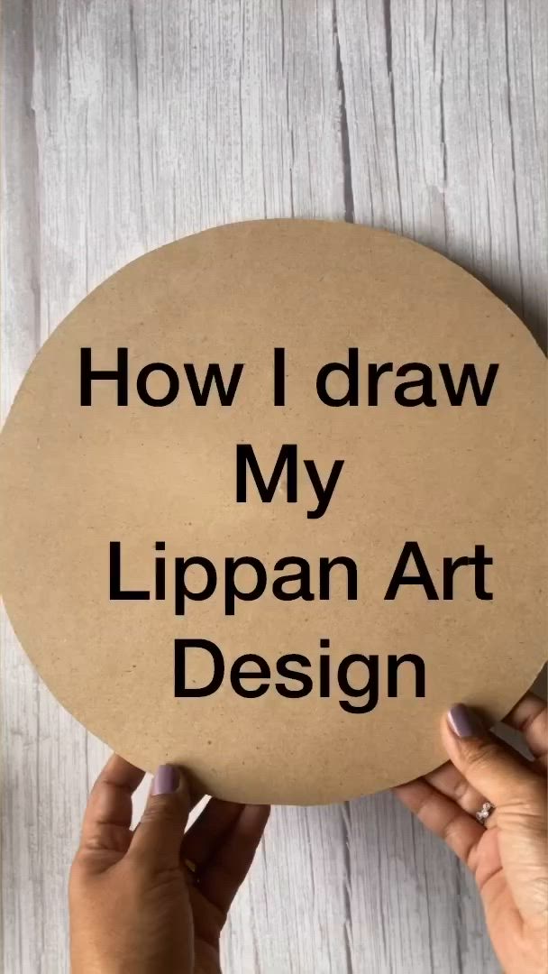 This may contain: someone is holding up a sign that says how i draw my lippan art design