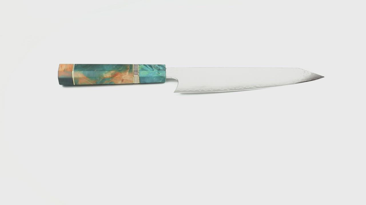 This may contain: a knife that is sitting on top of a white surface with the words one - off - a - kind 8'damacus steel chef's knife