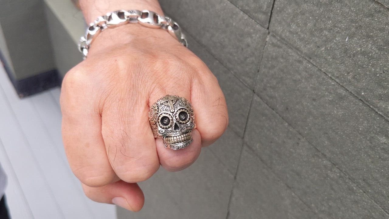 This contains: Sterling Silver Gold Brass Sugar Skull Ring