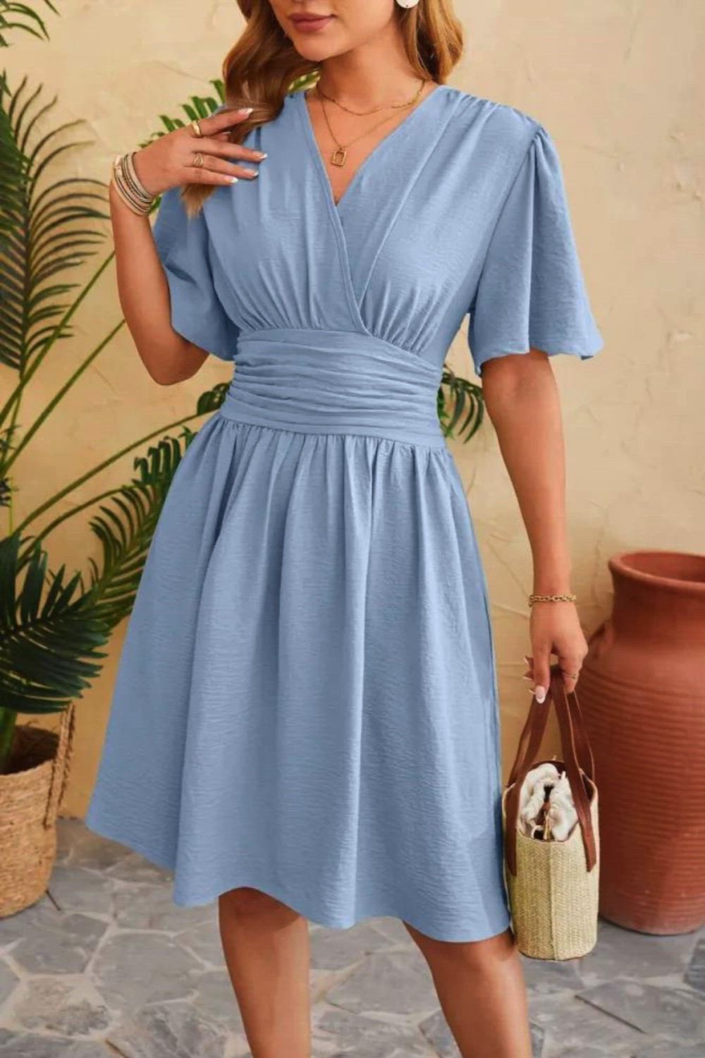 The V Neck Cinched Waist Bell Sleeve Dress is a stylish and feminine choice for any occasion. With its flattering V-neckline, cinched waist, and bell sleeves, it exudes elegance and sophistication. Perfect for both casual and dressy events, this dress offers a chic silhouette and timeless charm, ensuring you make a fashionable statement with grace and poise.