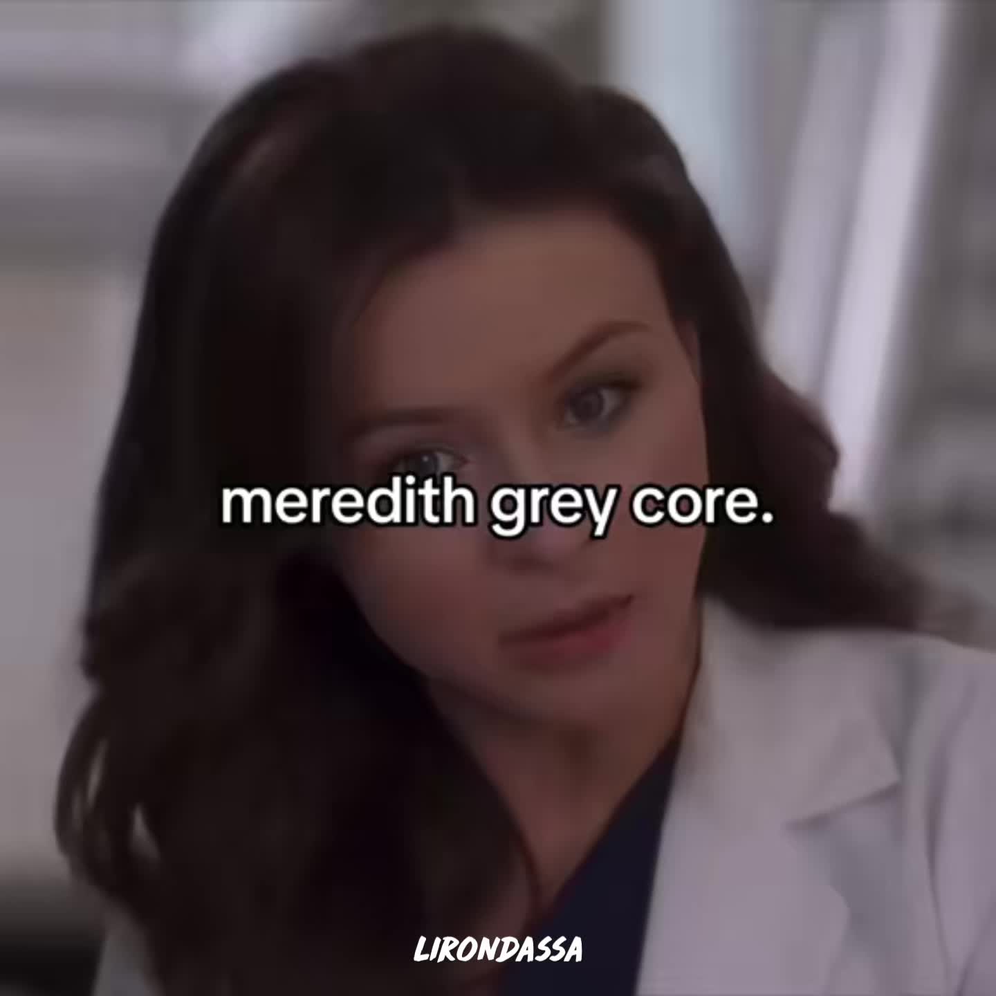 This may contain: a woman in a lab coat with the words meredth grey core