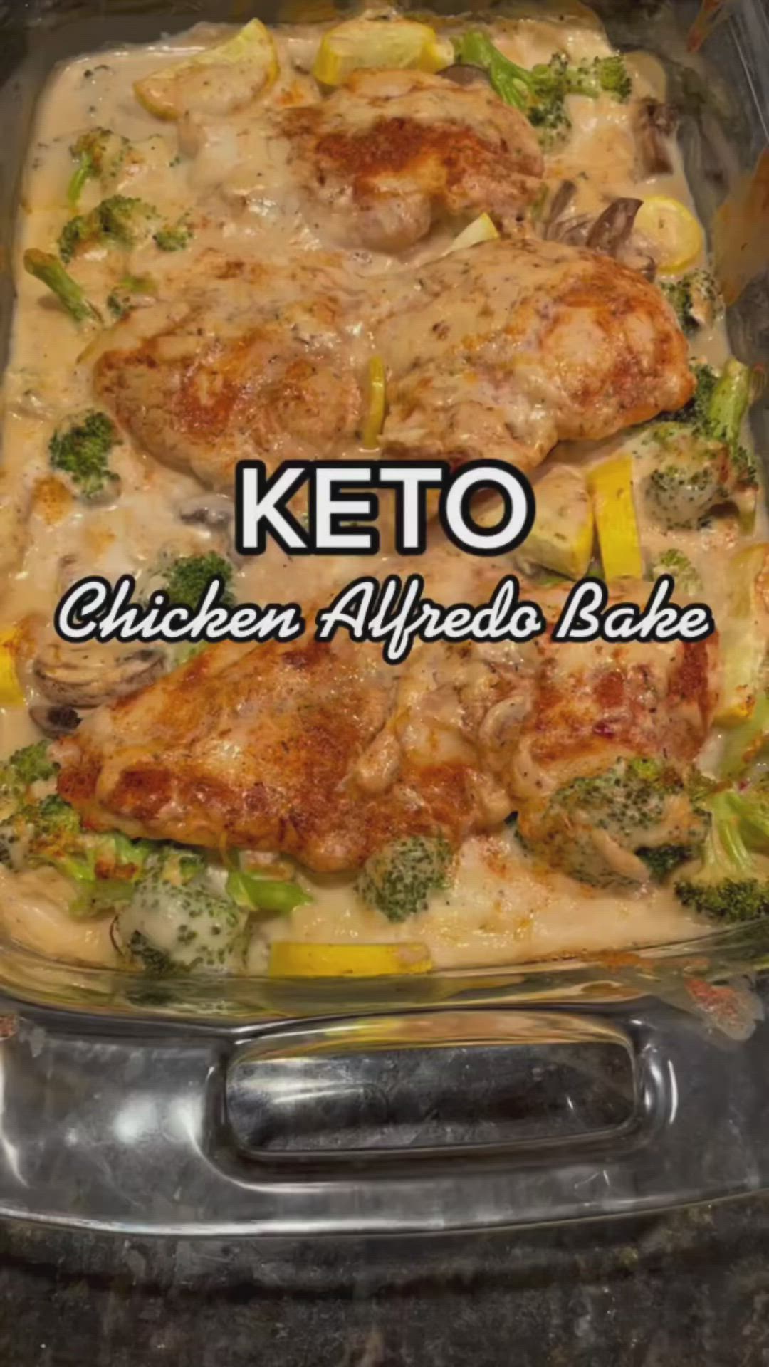 This may contain: chicken alfredo bake with broccoli and cheese in a glass casserole dish