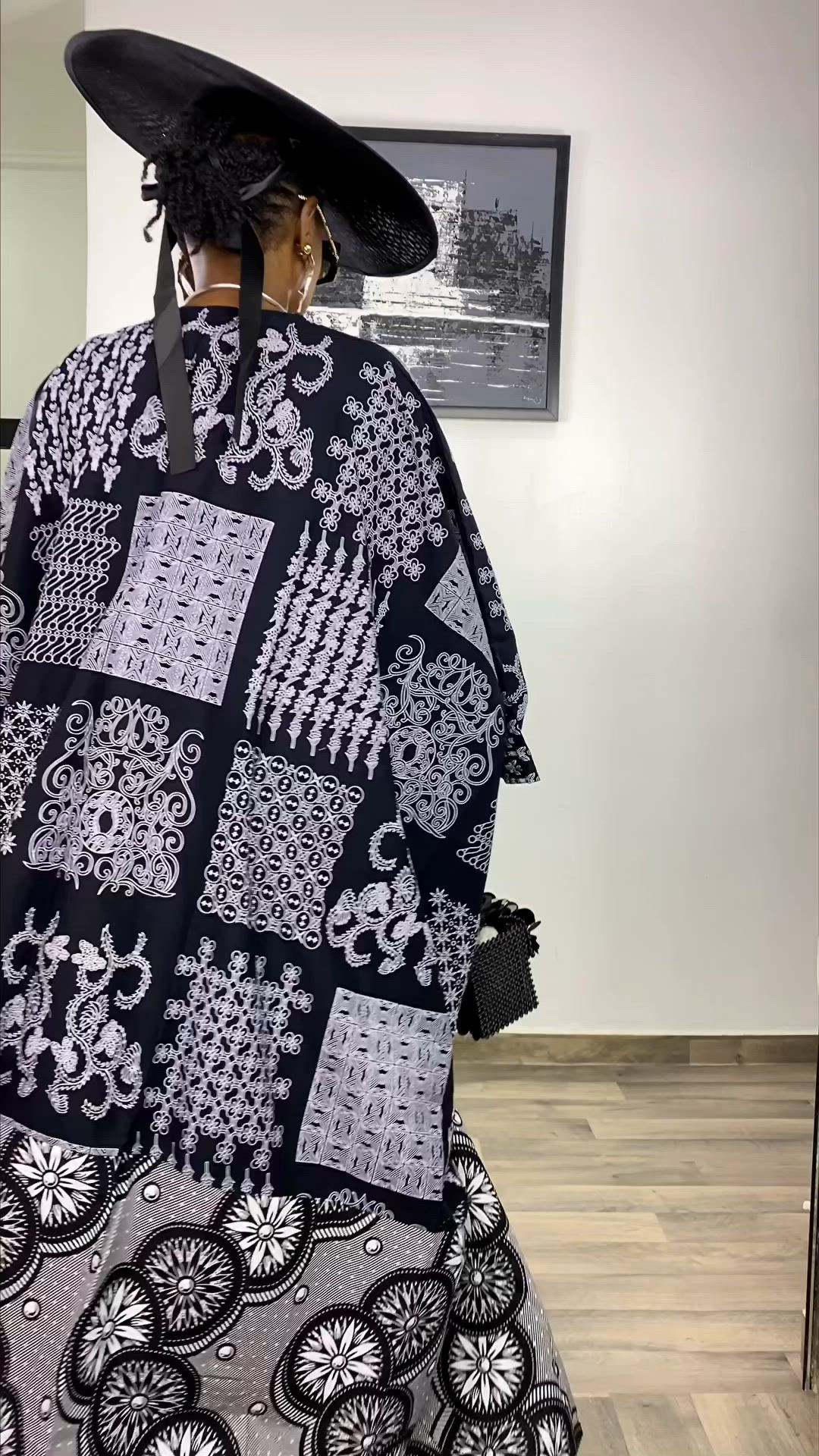 This contains an image of: Hat or scarf? Black and white ankara kimono ….