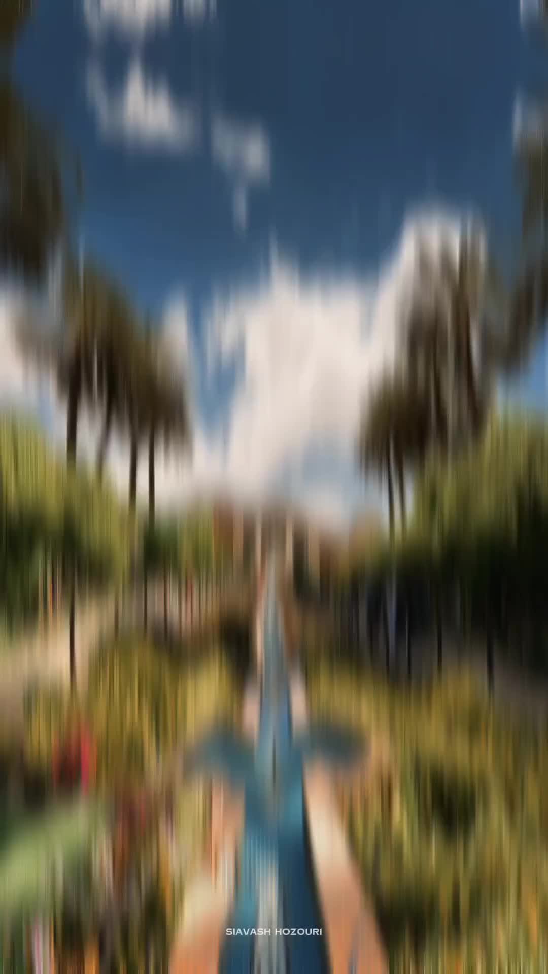 This may contain: a digital painting of a path leading to a pond with trees on both sides and clouds in the sky