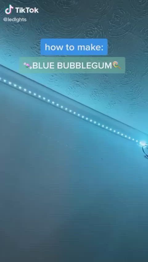 This may contain: a blue bubblegum machine is shown with the words how to make? on it