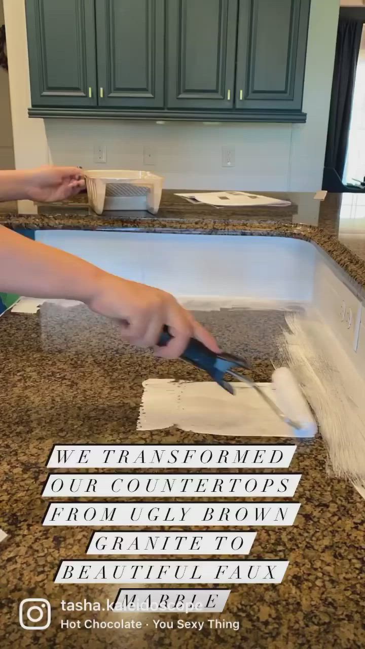 This may contain: a person cutting up some paper on top of a kitchen counter with scissors and tape