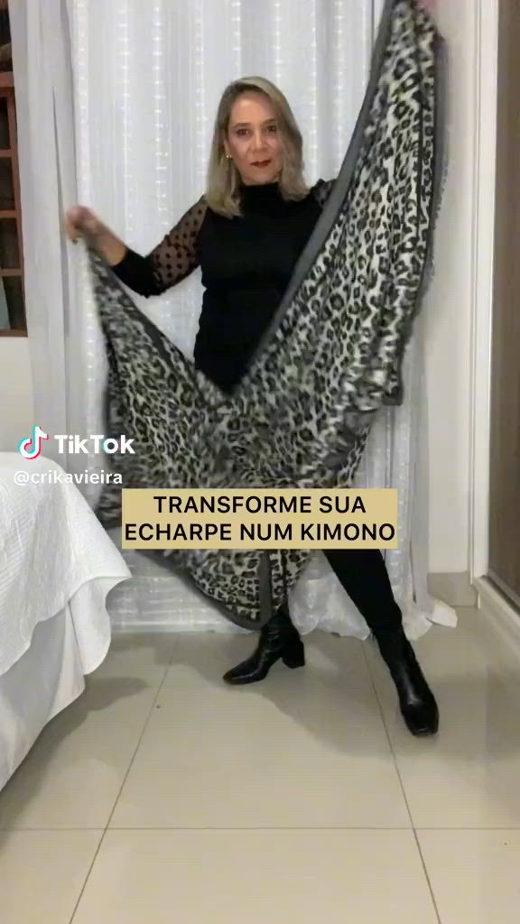 This contains an image of: TikTok · Cristiane Vieira