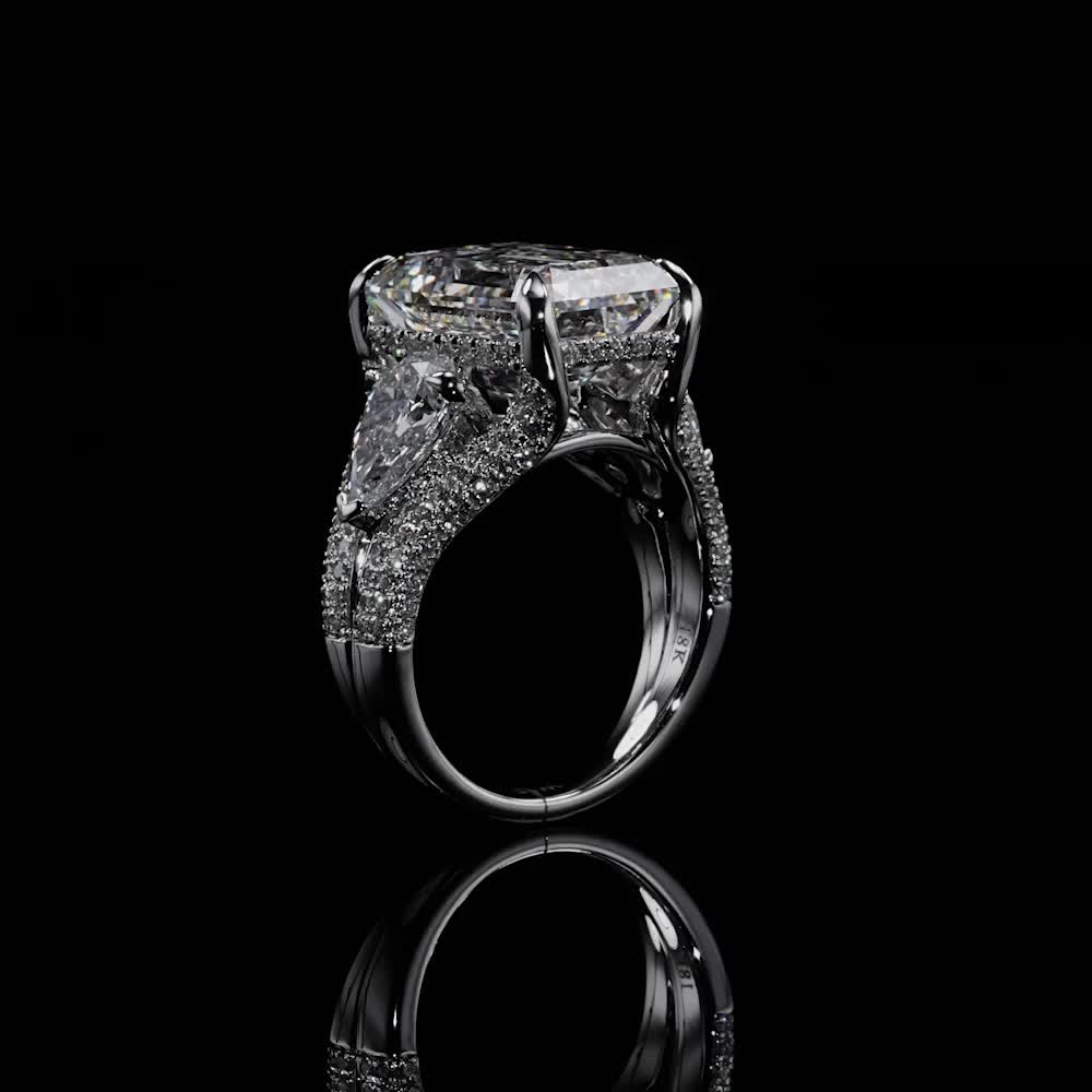 This may contain: a diamond ring on a black background