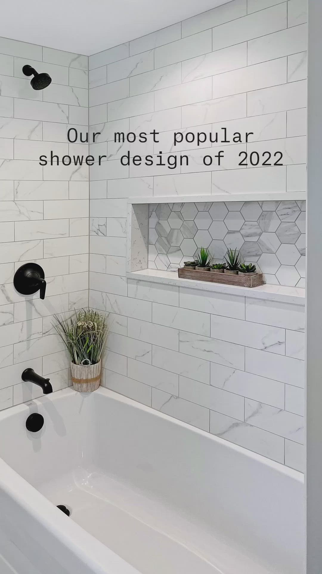 This may contain: a white bath tub sitting under a window next to a shelf filled with succulents