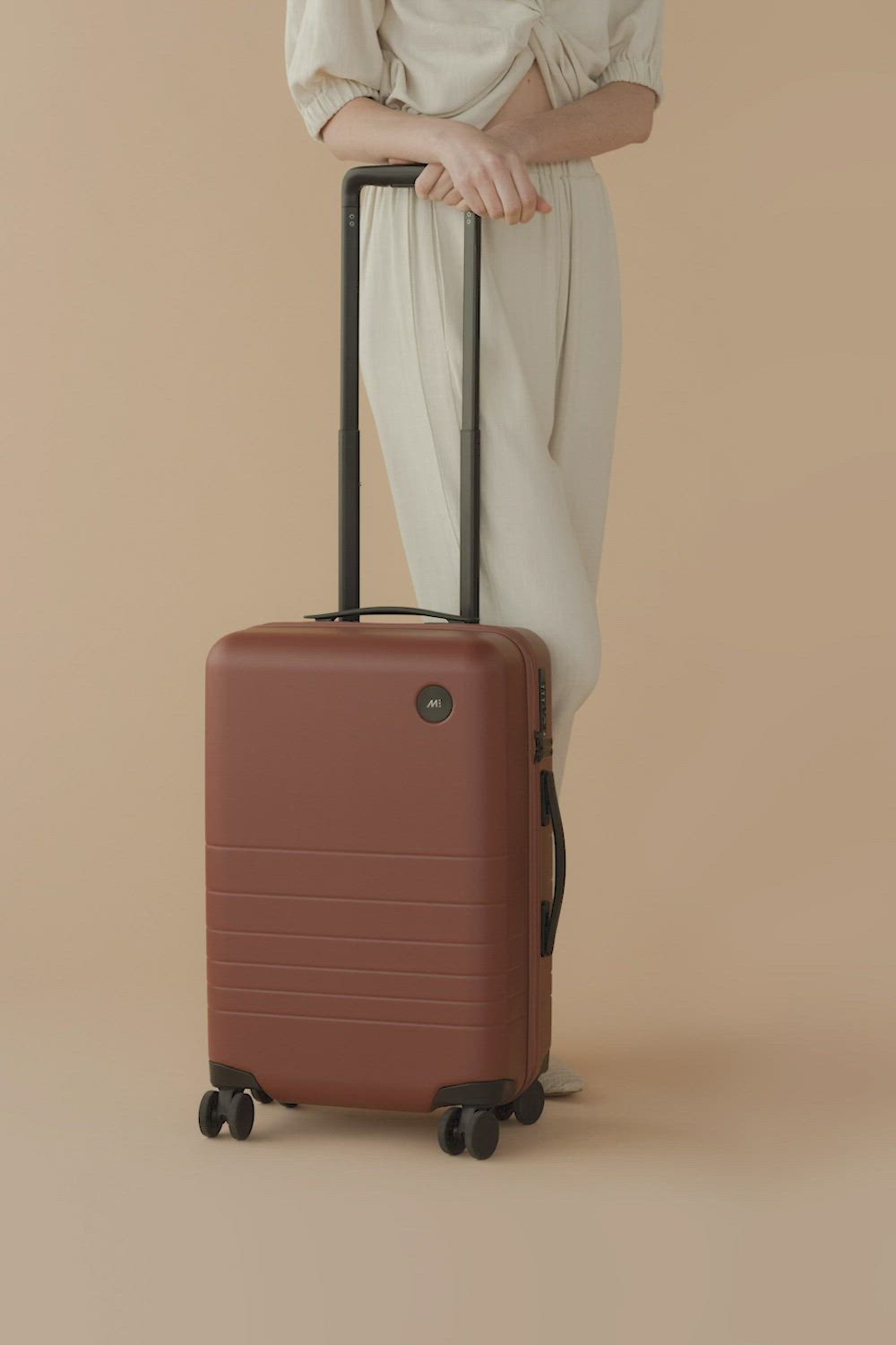 With its award-winning design and solid build, the Monos Carry-On is the perfect travel companion. Designed to fit in the overhead bin of almost any flight, anywhere in the world. Outfitted with an unbreakable polycarbonate shell, an ultra-sturdy telescopic handle, whisper-quiet wheels, vegan leather details, and all-premium materials.