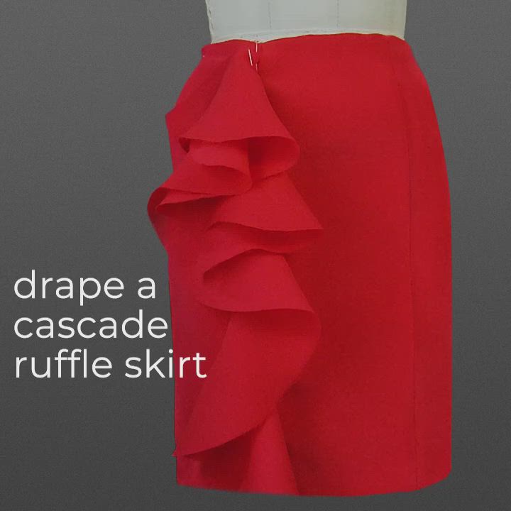 This may contain: a red skirt with ruffles on the bottom is shown in front of a mannequin