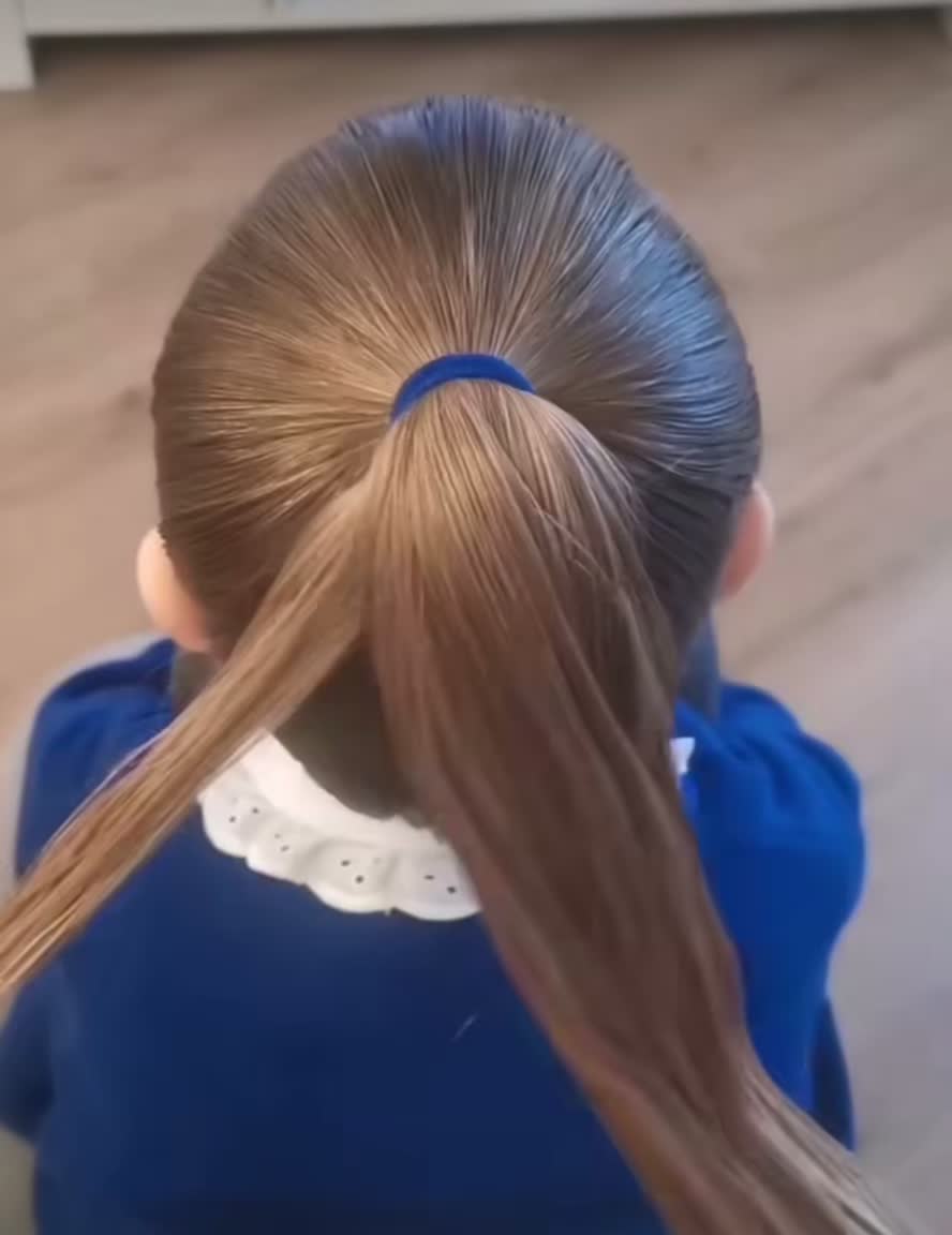 This contains: school hairstyle for baby girl