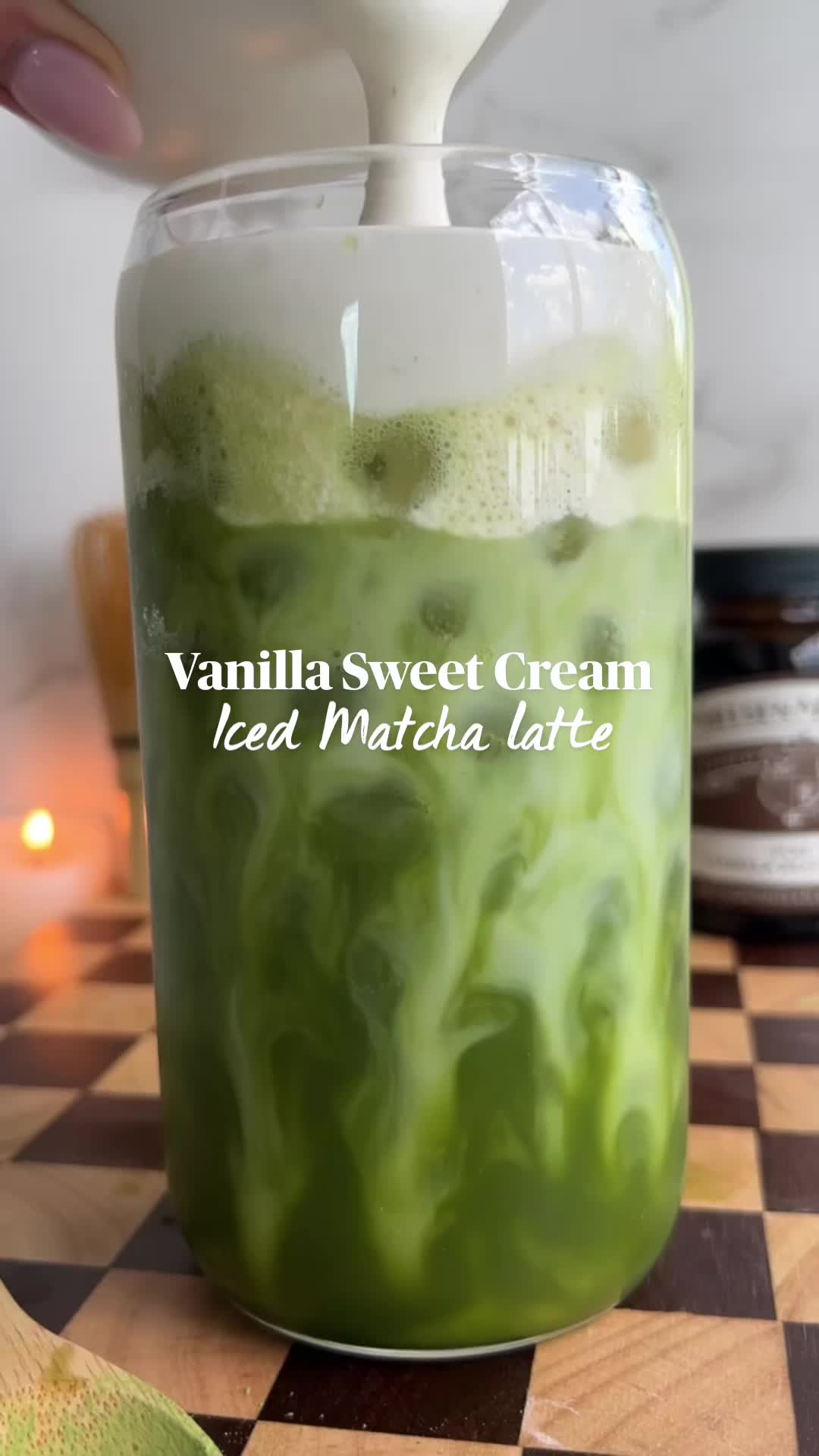 This may contain: vanilla sweet cream iced matcha latte