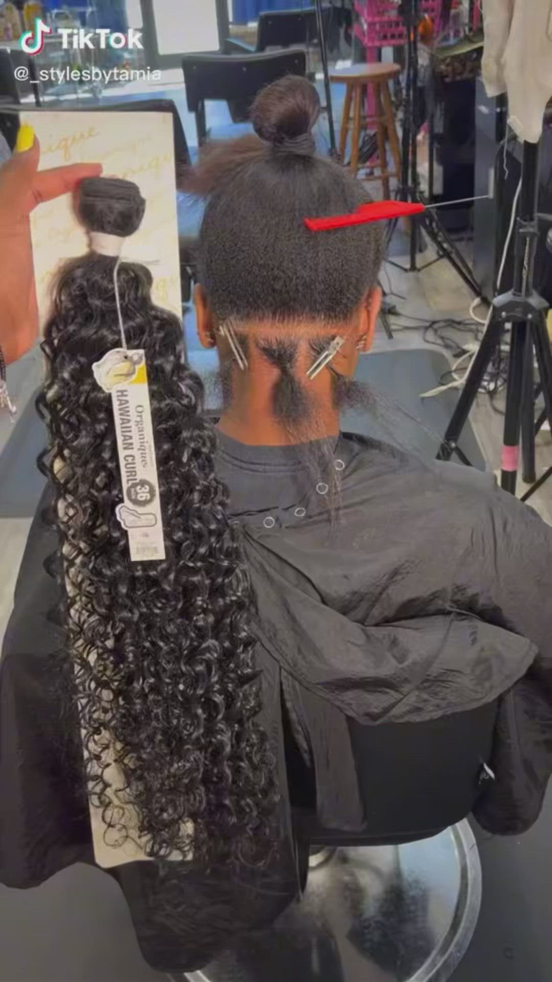 This contains an image of: braids with curls