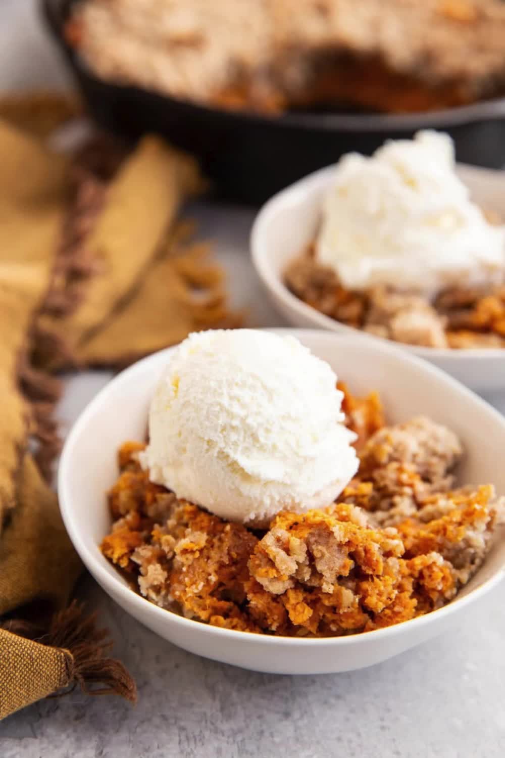 This easy Sweet Potato Crumble recipe features a sweet gooey sweet potato filling and a crisp streusel topping for a delicious crumble-style dessert. Includes gluten-free and dairy-free options!