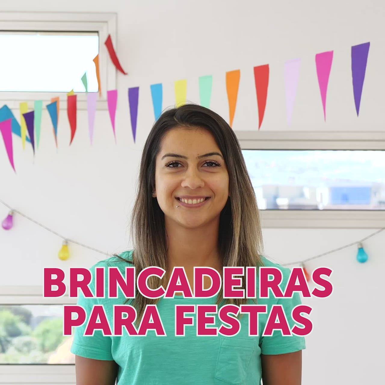 This may contain: a woman is standing in front of bunting streamers with the words brincadeiras para festas