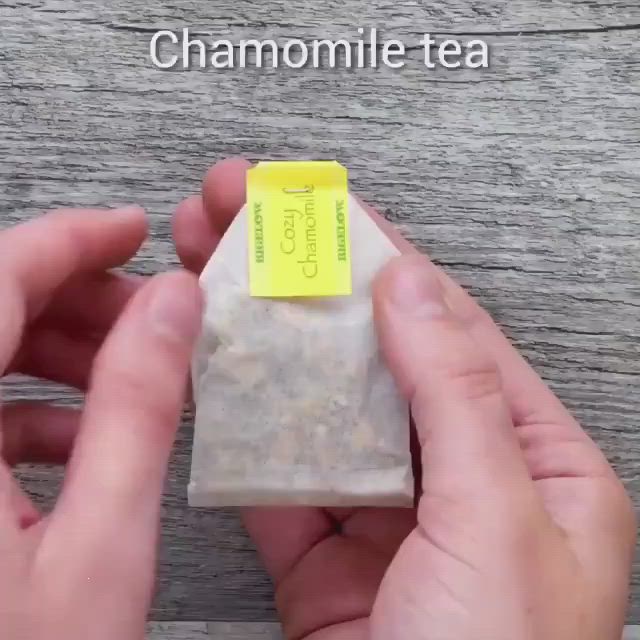 This may contain: someone is holding a small tea bag in their hands